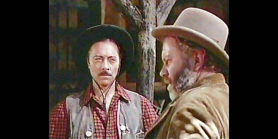 Bernard Nedell as Jack Lester, an outlaw who breaks into an empty safe in The Desperadoes (1943)