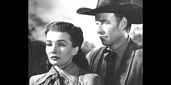 Bill Elliott as Jim McWade with Alice Sharp (Catherine McLeod), the girl he hopes to marry in The Fabulous Texan (1947)