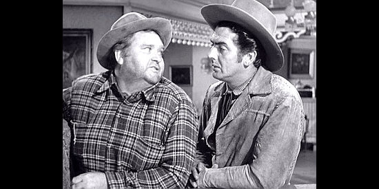 Charles Kemper as Peaceful Jones with Cash Blackwell (Victor Mature), a newcomer to town in Fury at Furnace Creek (1948)