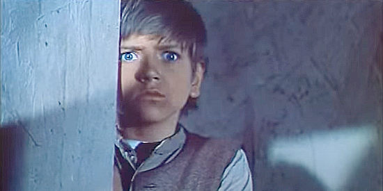Danny Sonnier (aka Walton), frightened by what he's witnessing in Stagecoach of the Condemned (1970)