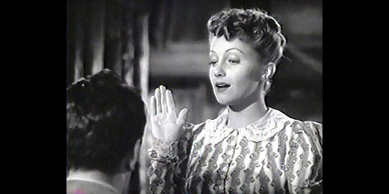 Diana Lewis as Eve Wilson, hoping to marry a Turner in Go West (1940)