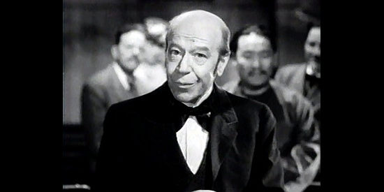 Donald Meek as Amos Budget, the pretend preacher who marries the stars in My Little Chickadee (1940)