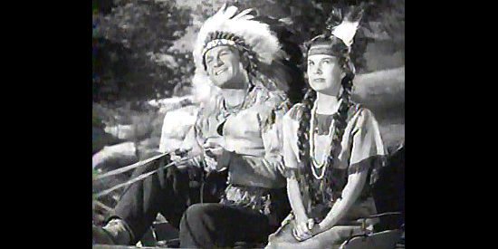 Eddie Albert as Daniel Bone and Gale Storm as Liza Crockett leave the Indian village in The Dude Goes West (1948)