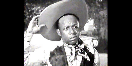 Eddie Anderson as Rochester, unwillingly roped into Jack's wild west adventure in Buck Benny Rides Again (1940)