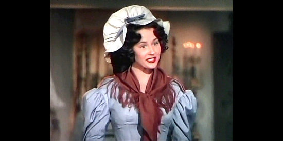Edna Skinner as Juanita, filling Teresa in on what it's like to be kissed by a bandit in The Kissing Bandit (1948)