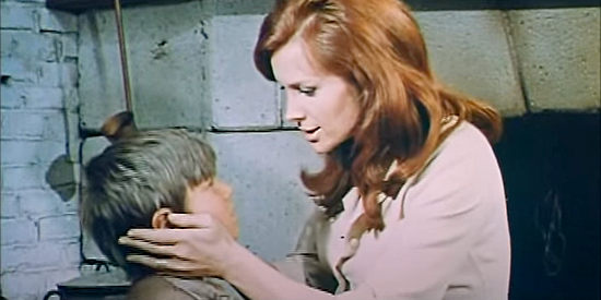 Erika Blance as Martha Sonnier (aka Walton) with son Danny in Stagecoach of the Condemned (1970)