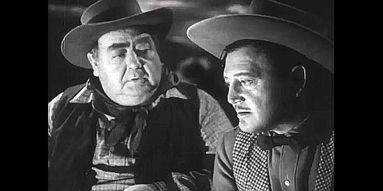 Eugene Pallette as Tom Waggoner working with Richard Dix as John Bonniwell to avoid Steve Barat's tolls in The Kansan (1943)