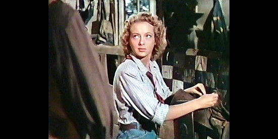 Evelyn Keyes as Allison McLeod, fretting about Cheyenne Rogers again in The Desperadoes (1943)