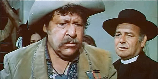 Fernando Sancho as Ramon Sartana with Preacher Herbert Green (Florencio Calpe), one of the stage passengers in Stagecoach of the Condemned (1970)