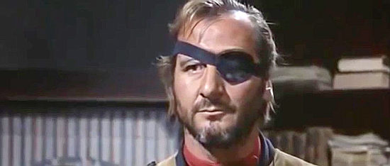 Franco Beltramme as Peter, Victor Barrett's lead henchman in Twice a Judas (1968)