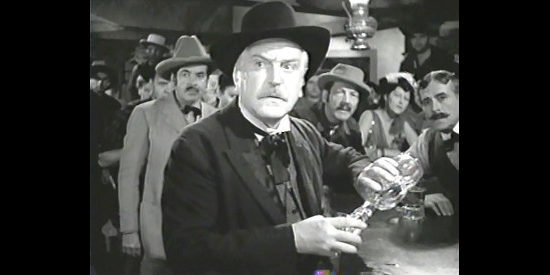 Frank Morgan as Judge Cotton, Lucy's father, engaging in one of his favorite activities in Honky Tonk (1941)