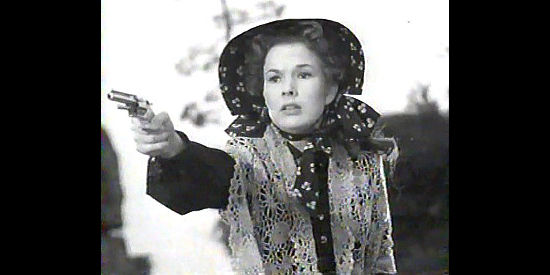 Gale Storm as Liza Crockett pulls her derringer on one of those untrustworthy men in The Dude Goes West (1948)