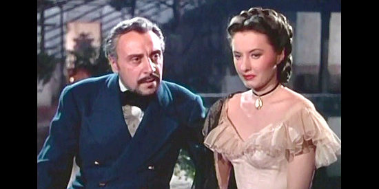 George Coulouis as Capt. Coffin and Barbara Stanwyck as Lily Bishop, a convenient couple in California (1947)