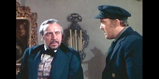 George Coulouris as Capt. Coffin discussing complications with Pike (Albert Dekker), his right-hand man in California (1947)