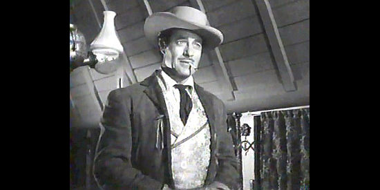 Gilbert Roland as Pecos Kid, ready to defend a woman's honor in The Dude Goes West (1948)