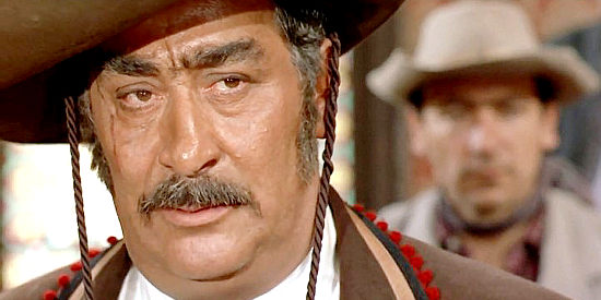 Gina Buzzanca as the Mexican gunfighter, eager to prove his skills against Gringo's Col. Mortimer in Ringo and Gringo Against All (1966)