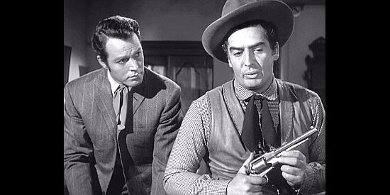 Glenn Langan as Rufe Blackwell and Victor Mature as Cash Blackwell in a tense reunion in Fury at Furnace Creek (1948)
