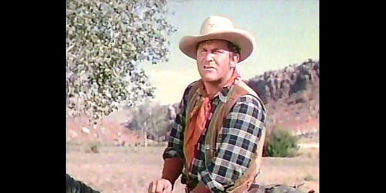 Guinn Williams as Nitro Rankin, Cheyenne's unpredictable sidekick in The Desperadoes (1943)