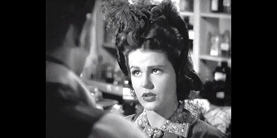 Helen Parrish as Ellen Sanford, trying to lure Tom Craig back to Sacramento in In Old California (1942)