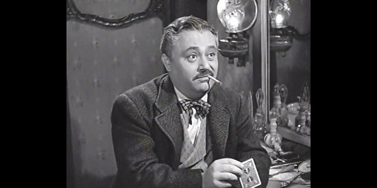 J. Edward Bromberg as Harry Kane, manager of the traveling show in I Shot Jesse James (1949)