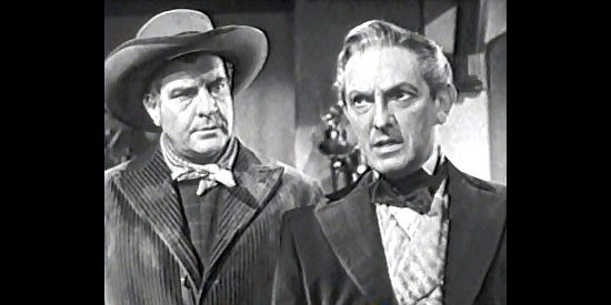 Joseph Schildkraut as Clarke Faulkner, balking at Laroux's latest order while Laroux's right-hand man looks on in The Gallant Legion (1948)