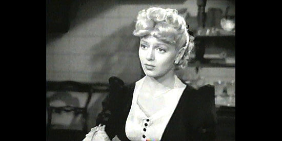 Lana Turner as Lucy Cotton, determined to beat her beau at his own game in Honky Tonk (1941)