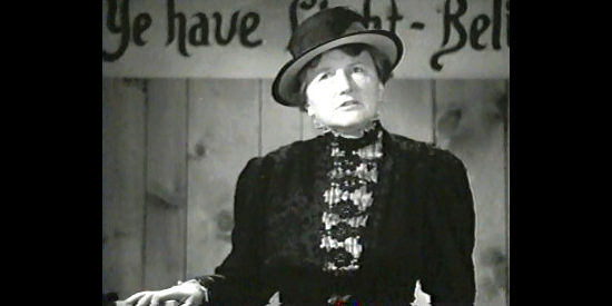 Marjorie Main as Mrs. Varner, taking her late husband's place at the pulpit in Honky Tonk (1941)