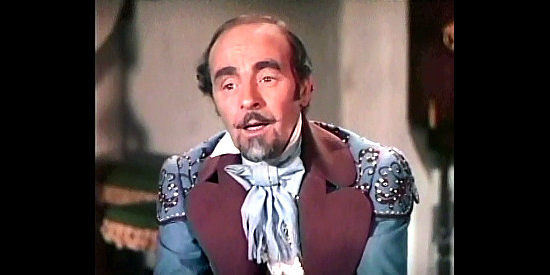 Mikhail Rasumny as Don Jose, trying to talk birds and bees with his daughter in The Kissing Bandit (1948)