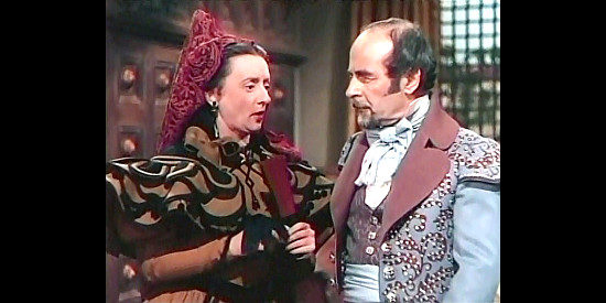 Mildred Natwick as Aunt Isabella filling in Don Jose (Mikhail Rasumny) on his daughter's encounter in The Kissing Bandit (1948)