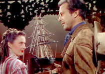 Barbara Stanwyck as Lily and Ray Milland as Jonathan Trumbo, sharing stories of a slave-trading past in California (1947)