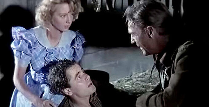 Evelyn Keyes as Allison McLeod, Glenn Ford as Cheyenne Rogers and Randolph Scott as Steve Upton in The Desperadoes (1943)