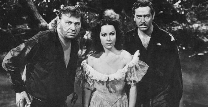 Wallace Beery as Sgt. Barstown, Dolores Del Rio as Jenny Sanford and John Howard as Lt. Oliver Clark trying to escape through a swamp in The Man from Dakota (1940)