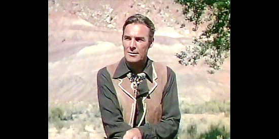Randolph Scott as Sheriff Steve Upton, trying to keep an old friend out of trouble in The Desperadoes (1943)