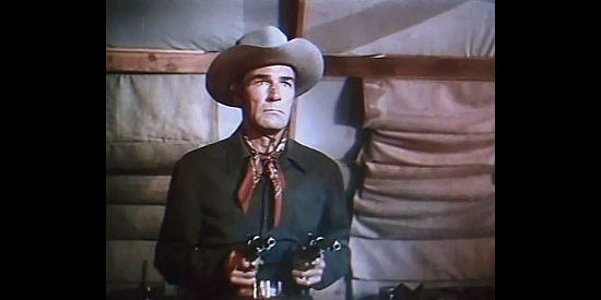Randolph Scott as Tom Andrews, solving problems with his six shooters in Canadian Pacific (1949)
