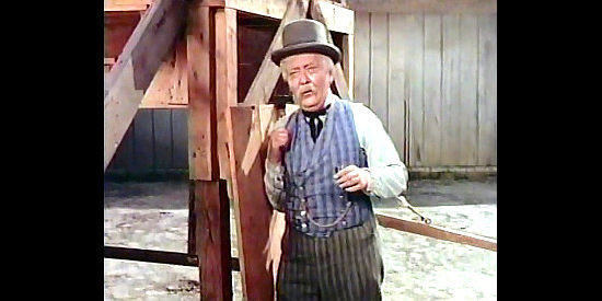 Raymond Walburn as Judge Cameron, a mayor hellbent on hanging someone in The Desperadoes (1943)