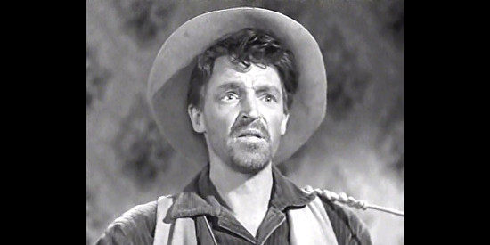Robin Short as the troubadour who crosses paths with Bob Ford in I Shot Jesse James (1949)