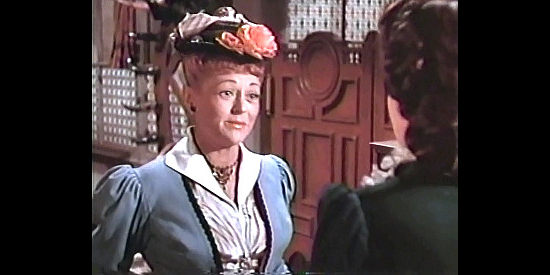 Sally Eilers as Della Harms, the ranch owner who hires Chris Denning as her foreman in Coroner Creek (1948)
