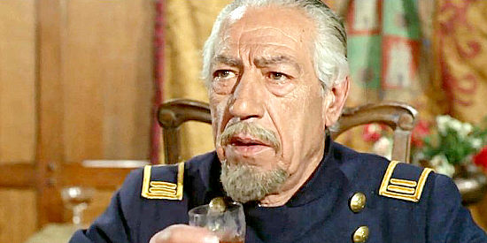 Santiago Rivero as Col. Martin, shocked by what he witnesses at a dinner party in Ringo and Gringo Against All (1966)