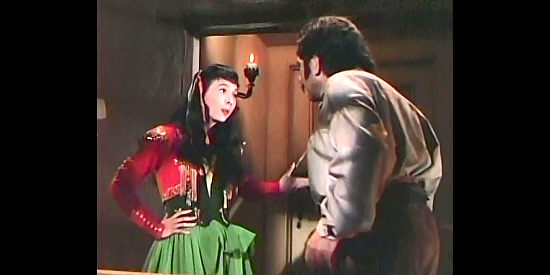 Sono Osato as Bianca, confused as to why her saucy, whip-wielding dance scared Ricardo in The Kissing Bandit (1948)