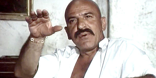 Telly Savalas as Pancho Villa, explaining his grand vision in Pancho Villa (1972)