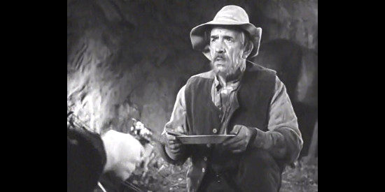Victor Kilian as Soapy, wondering about his partner Bob Ford's intentions in I Shot Jesse James (1949)