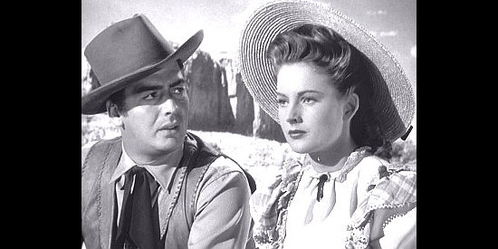 Victor Mature as Cash Blackwell and Coleen Gray as Molly Stevens talk about a massacre in Fury at Furnace Creek (1948)