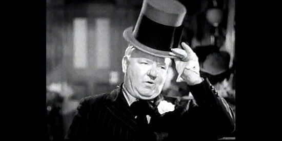W.C. Fields as Cuthbert Twillie, tipping his hat like the gentleman he isn't in My Little Chickadee (1940)