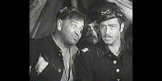 Wallace Beery as Sgt. Barstow and John Howard as Lt. Oliver Clark in The Man from Dakota (1940)