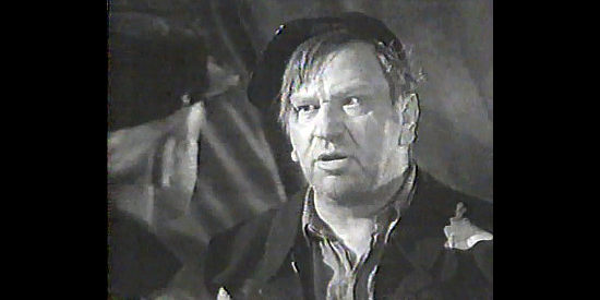 Wallace Beery as Sgt. Barstow, showing no interest in an escape attempt in The Man from Dakota (1940)