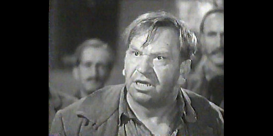 Wallace Beery as Sgt. Barstow, trying to avoid a hangman's noose in The Man from Dakota (1940)