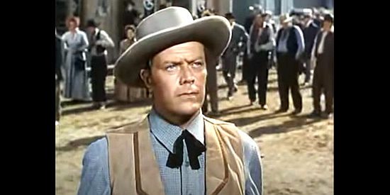 Willard Parker as Sheriff Will Egan, suspicious of Sam Bass when he arrives in Denton in Calamity Jane and Sam Bass (1949)