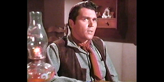 William Bishop as Leach Conover, one of Della's ranch hands in Coroner Creek (1948)