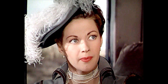 Yvonne De Carlo as Lillian Marlowe, hearing about the O'Hara fortune for the first time in The Gal Who Took the West (1949)