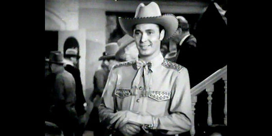 Barry Sullivan as King Kennedy, getting his first glimpse of saloon girl Dora Hand in The Woman of the Town (1943)